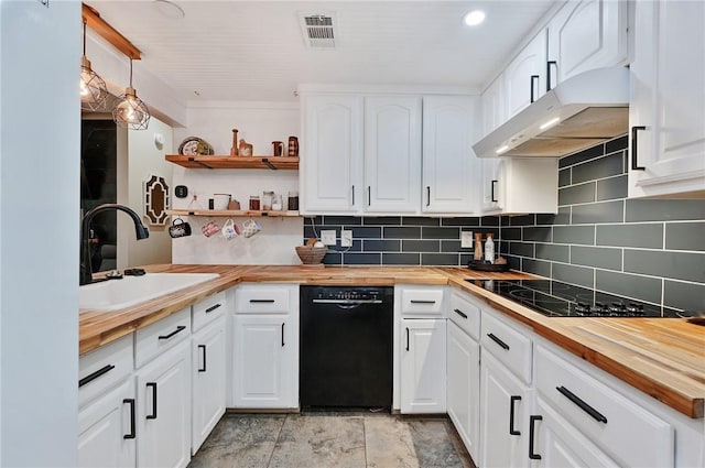 kitchen featuring black appliances, white cabinetry, extractor fan, and wood counters