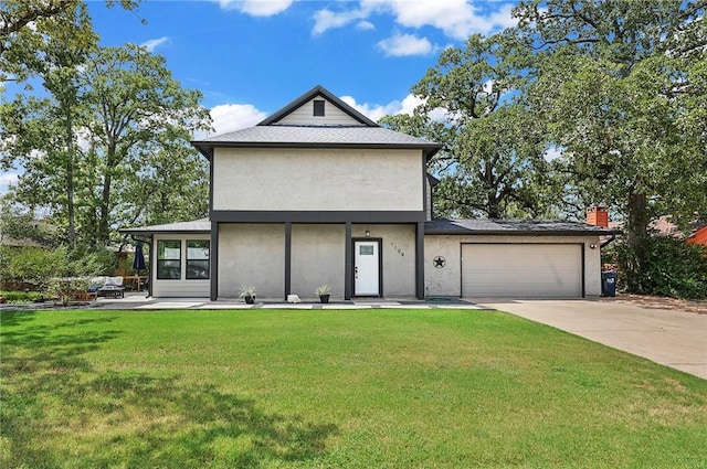 exterior space with a garage and a front lawn