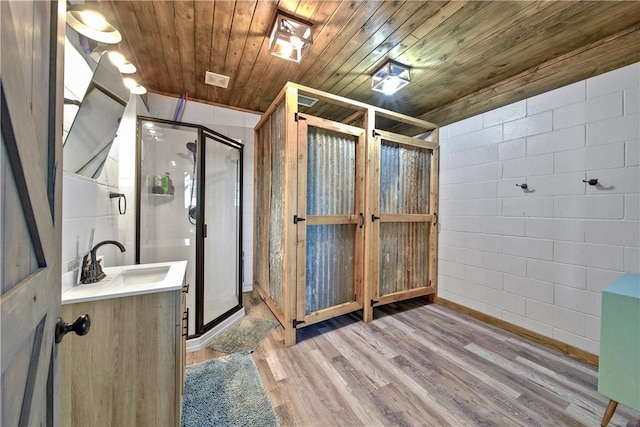 2289 Old Dobbin Rd, Montgomery, TX 77316 - full bathroom with wood finished floors, a stall shower, vanity, and wood ceiling