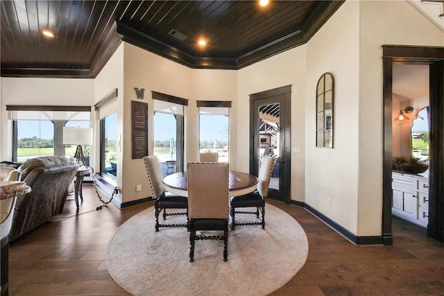 2289 Old Dobbin Rd, Montgomery, TX 77316 - dining room with wooden ceiling, dark wood-type flooring, crown molding, and recessed lighting