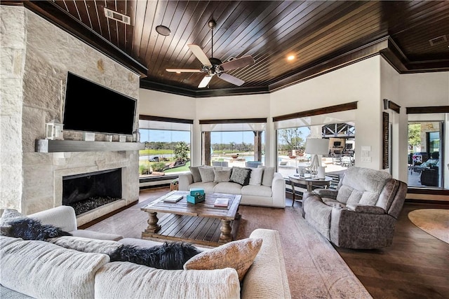 2289 Old Dobbin Rd, Montgomery, TX 77316 - living area with crown molding, wood ceiling, plenty of natural light, a large fireplace, and ceiling fan