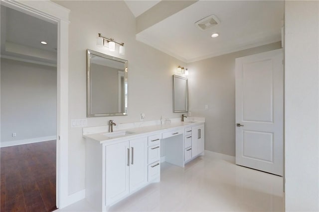 bathroom featuring vanity and hardwood / wood-style flooring