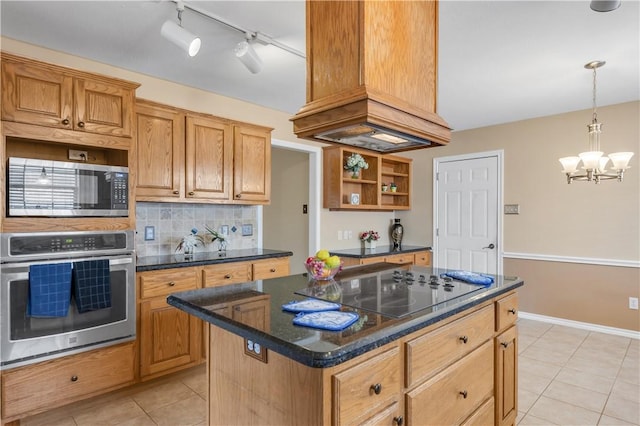 kitchen with light tile patterned floors, a center island, stainless steel appliances, open shelves, and backsplash