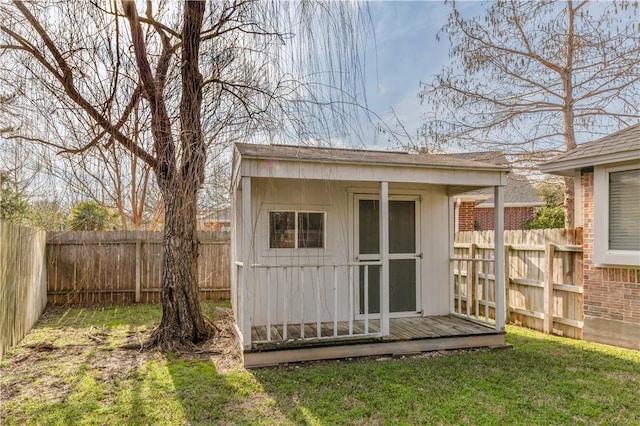 view of shed with a fenced backyard