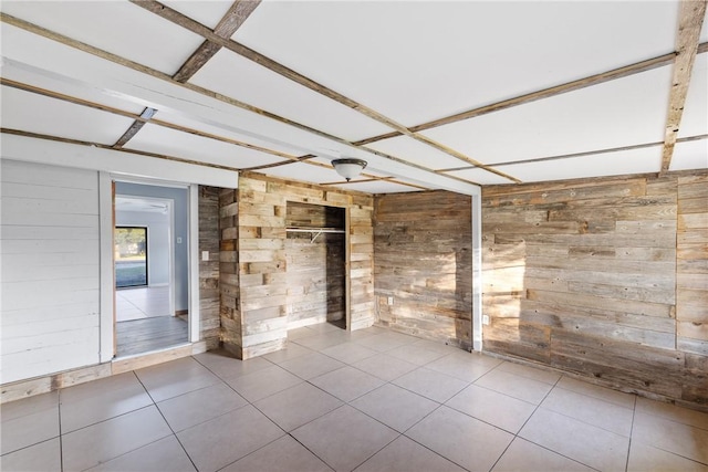 tiled empty room with wooden walls