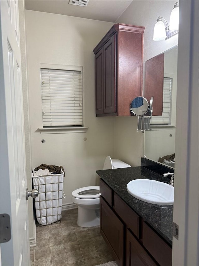 152 Forest Dr, College Station, TX 77840 - bathroom with vanity and tile patterned floors
