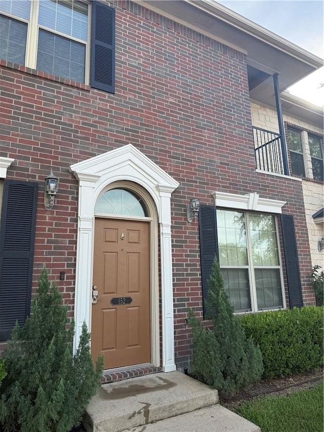 152 Forest Dr, College Station, TX 77840 - doorway to property featuring brick siding