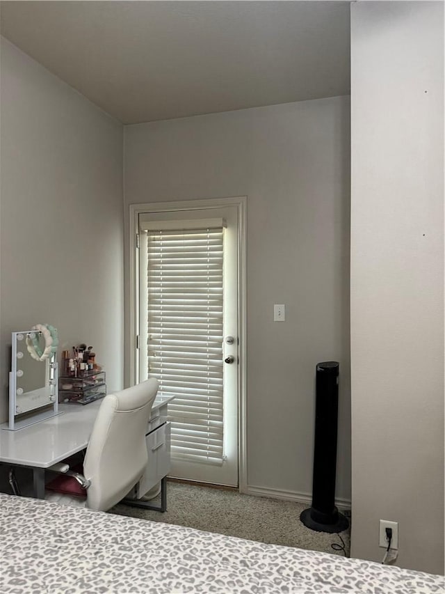 152 Forest Dr, College Station, TX 77840 - carpeted bedroom with baseboards and a desk