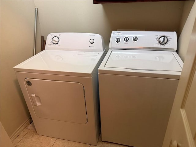 152 Forest Dr, College Station, TX 77840 - washroom with washing machine and dryer and light tile patterned floors