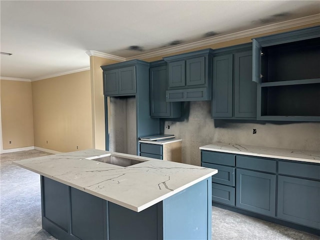 807 S Coulter Dr, Bryan, TX 77803 - kitchen featuring an island with sink, ornamental molding, and light stone countertops
