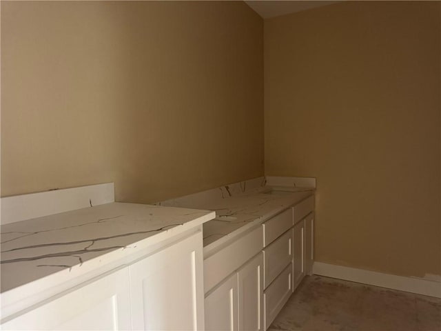 807 S Coulter Dr, Bryan, TX 77803 - bathroom featuring vanity and baseboards