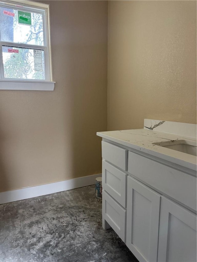 807 S Coulter Dr, Bryan, TX 77803 - bathroom with vanity and baseboards