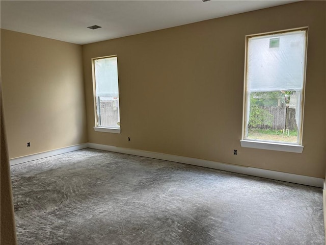 807 S Coulter Dr, Bryan, TX 77803 - spare room featuring carpet and baseboards