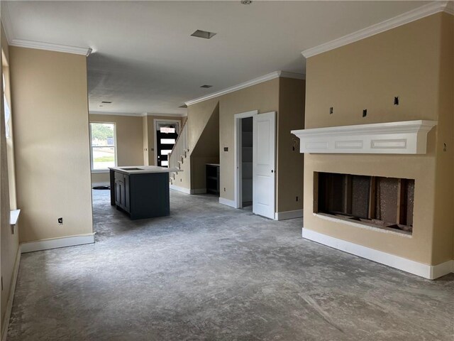807 S Coulter Dr, Bryan, TX 77803 - unfurnished living room with crown molding, stairs, and a fireplace