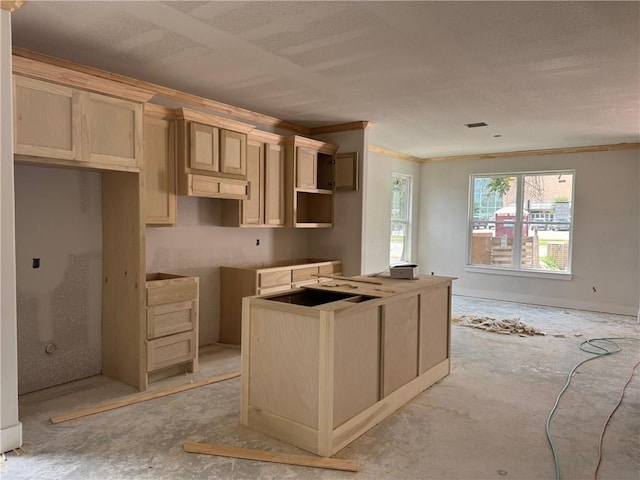 807 S Coulter Dr, Bryan, TX 77803 - kitchen with ornamental molding, a center island, and a textured ceiling