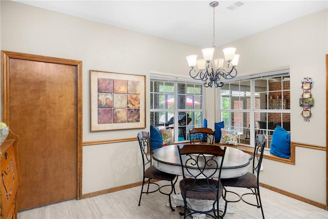 1713 Cardinal Ln, College Station, TX 77845 - dining space with a chandelier and baseboards