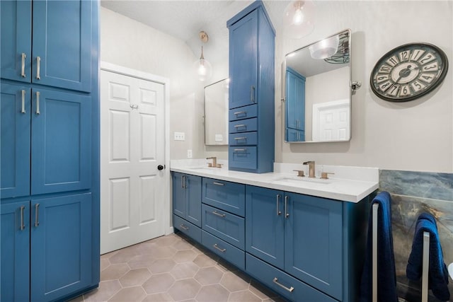 1713 Cardinal Ln, College Station, TX 77845 - bathroom with double vanity and tile patterned floors