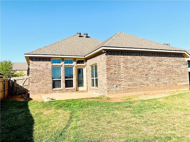15313 Lowry Meadow Ln, College Station, TX 77845 - rear view of house with brick siding, a patio, and a shingled roof