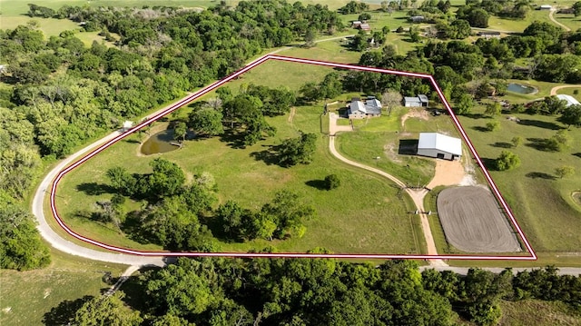 2355 Jackson League Cir, Brenham, TX 77337 - aerial view of property and surrounding area featuring property parcel outlined and a large body of water