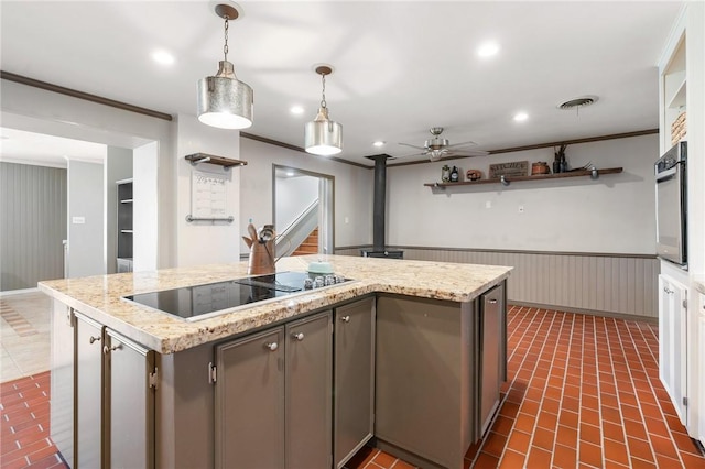 2355 Jackson League Cir, Brenham, TX 77337 - kitchen featuring black electric cooktop, a ceiling fan, stainless steel oven, open shelves, and decorative light fixtures