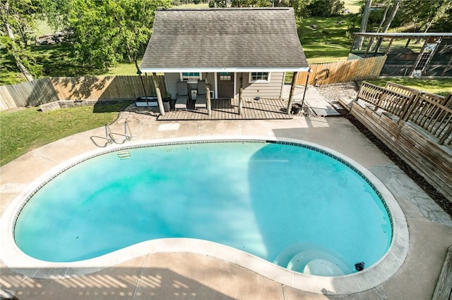 2355 Jackson League Cir, Brenham, TX 77337 - view of pool with a patio, a fenced backyard, and an outdoor structure