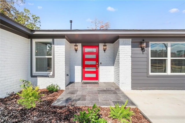 3004 Woodville Rd, Bryan, TX 77803 - doorway to property with brick siding