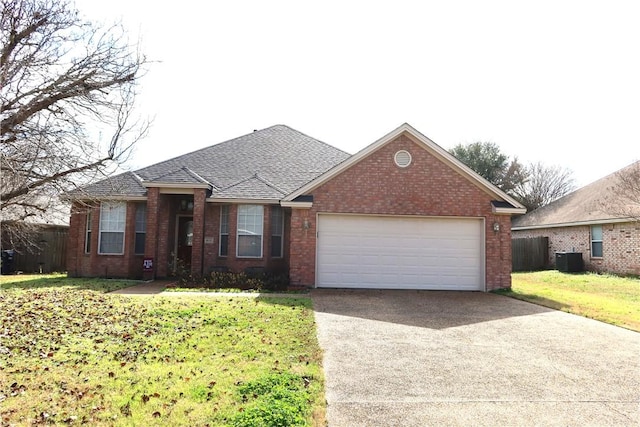 ranch-style home with a garage, central AC unit, and a front lawn