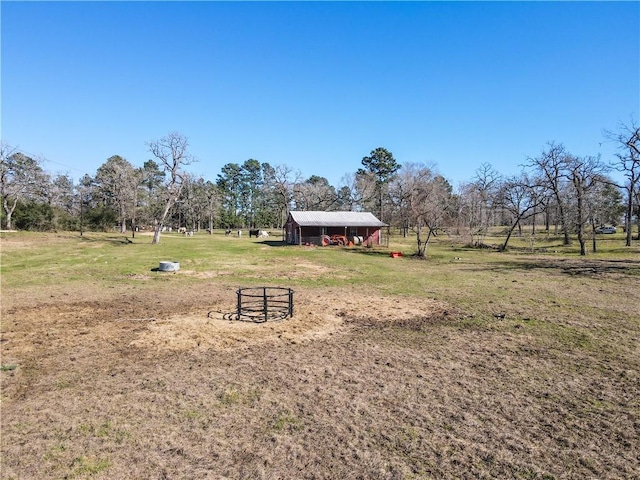 22349 Fm 359th Rd, Hempstead, TX 77445 - view of green lawn featuring an outbuilding