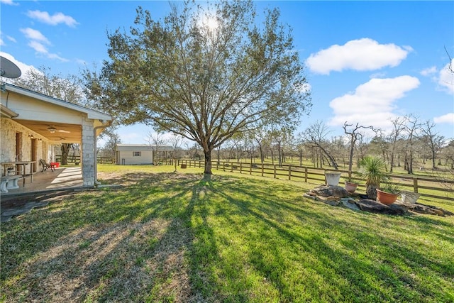 22349 Fm 359th Rd, Hempstead, TX 77445 - view of yard with ceiling fan and a patio area