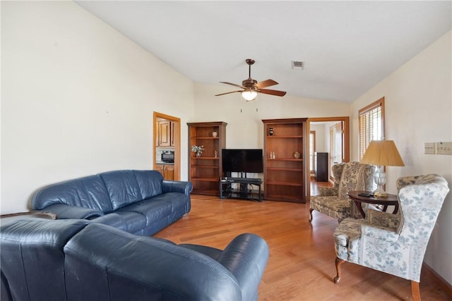 22349 Fm 359th Rd, Hempstead, TX 77445 - living area featuring lofted ceiling, a ceiling fan, and light wood-style flooring