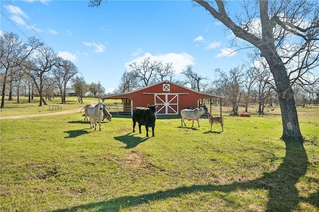 22349 Fm 359th Rd, Hempstead, TX 77445 - view of home's community featuring a barn, an outdoor structure, a lawn, an exterior structure, and a view of countryside