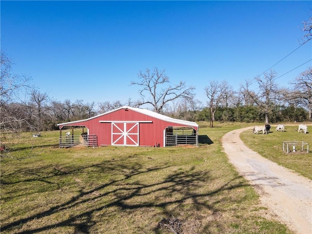 22349 Fm 359th Rd, Hempstead, TX 77445 - view of pole building featuring a lawn