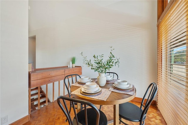 dining room with light parquet floors