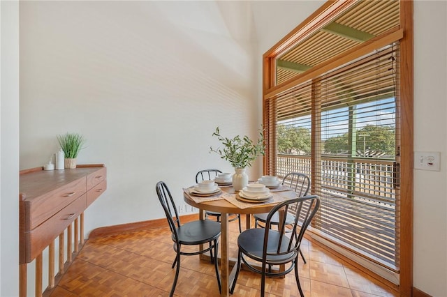 dining room with light parquet flooring