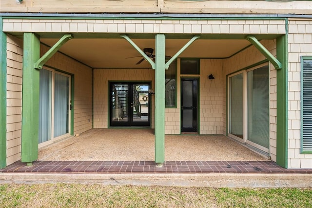 doorway to property featuring a patio and french doors