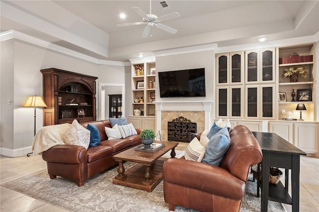 living room featuring visible vents, ceiling fan, recessed lighting, a tile fireplace, and light tile patterned floors