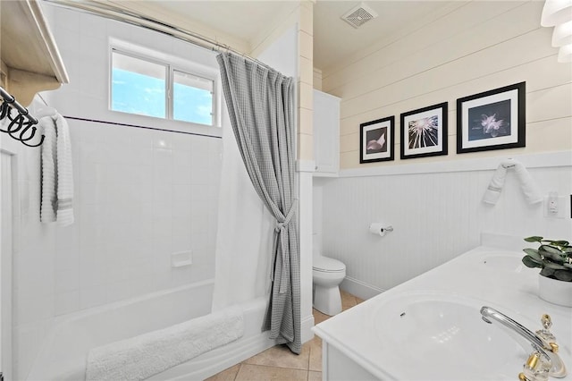full bathroom featuring visible vents, tile patterned flooring, toilet, shower / bathtub combination with curtain, and a sink