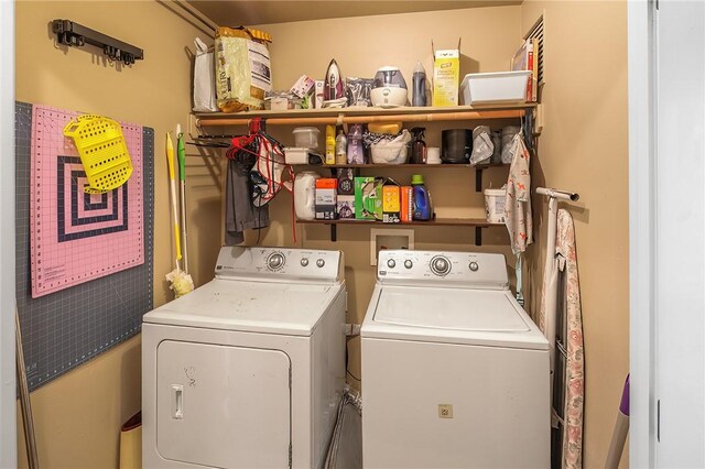 laundry area featuring independent washer and dryer