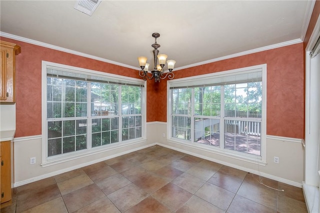 705 Summerglen Dr, College Station, TX 77840 - unfurnished dining area featuring a chandelier, ornamental molding, and tile patterned floors