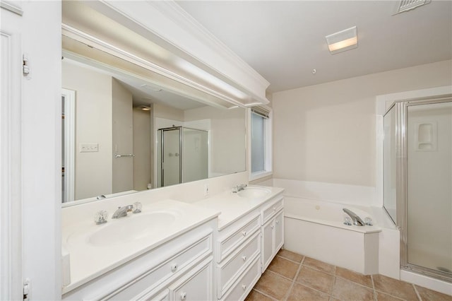 705 Summerglen Dr, College Station, TX 77840 - full bath featuring a shower stall, double vanity, and a bath