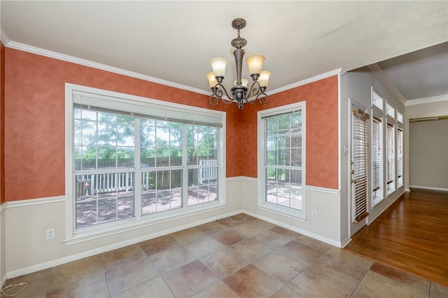705 Summerglen Dr, College Station, TX 77840 - unfurnished dining area featuring a chandelier, ornamental molding, and tile patterned flooring