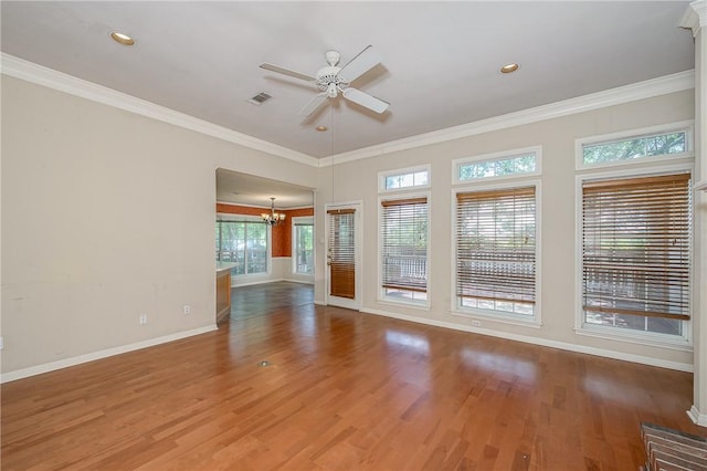 705 Summerglen Dr, College Station, TX 77840 - unfurnished room featuring a chandelier, ceiling fan, wood finished floors, crown molding, and recessed lighting