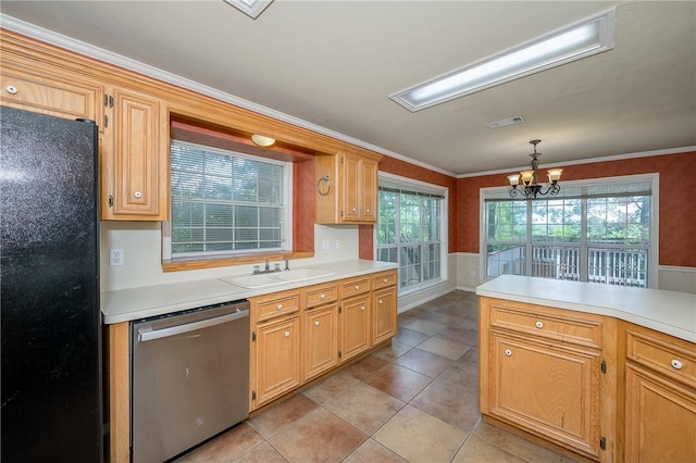 705 Summerglen Dr, College Station, TX 77840 - kitchen with dishwasher, freestanding refrigerator, light countertops, a chandelier, and a wainscoted wall