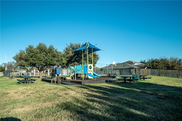 view of jungle gym with a yard