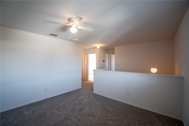 carpeted empty room with ceiling fan