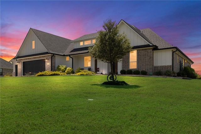 view of front of home with a lawn