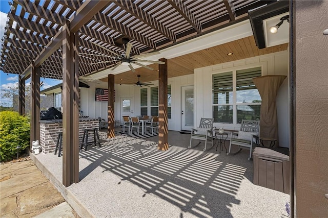 view of patio / terrace with a pergola and ceiling fan