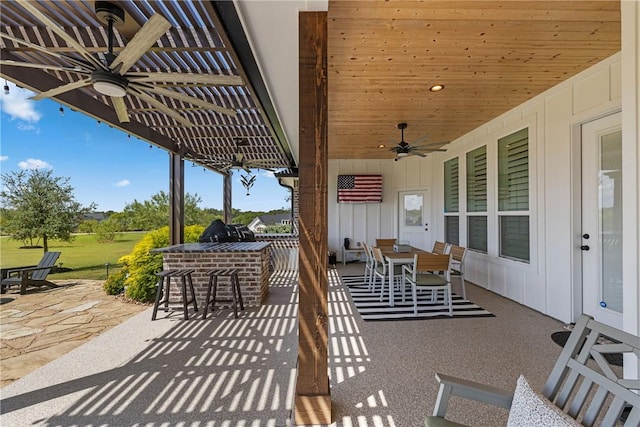 view of patio featuring exterior bar