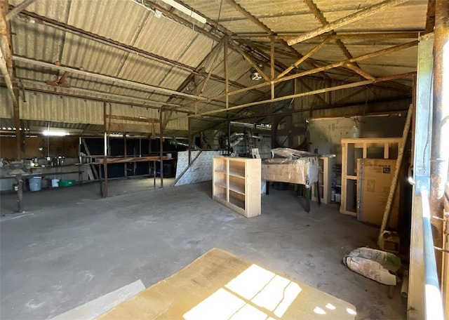 409 S Ave, C, TX 77541 - miscellaneous room with vaulted ceiling and concrete flooring