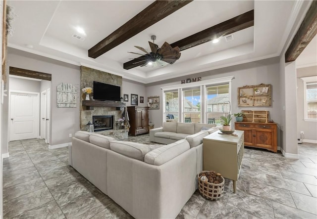 4004 Wild Creek Ct, College Station, TX 77845 - living area with a tray ceiling, ceiling fan, plenty of natural light, a fireplace, and beamed ceiling